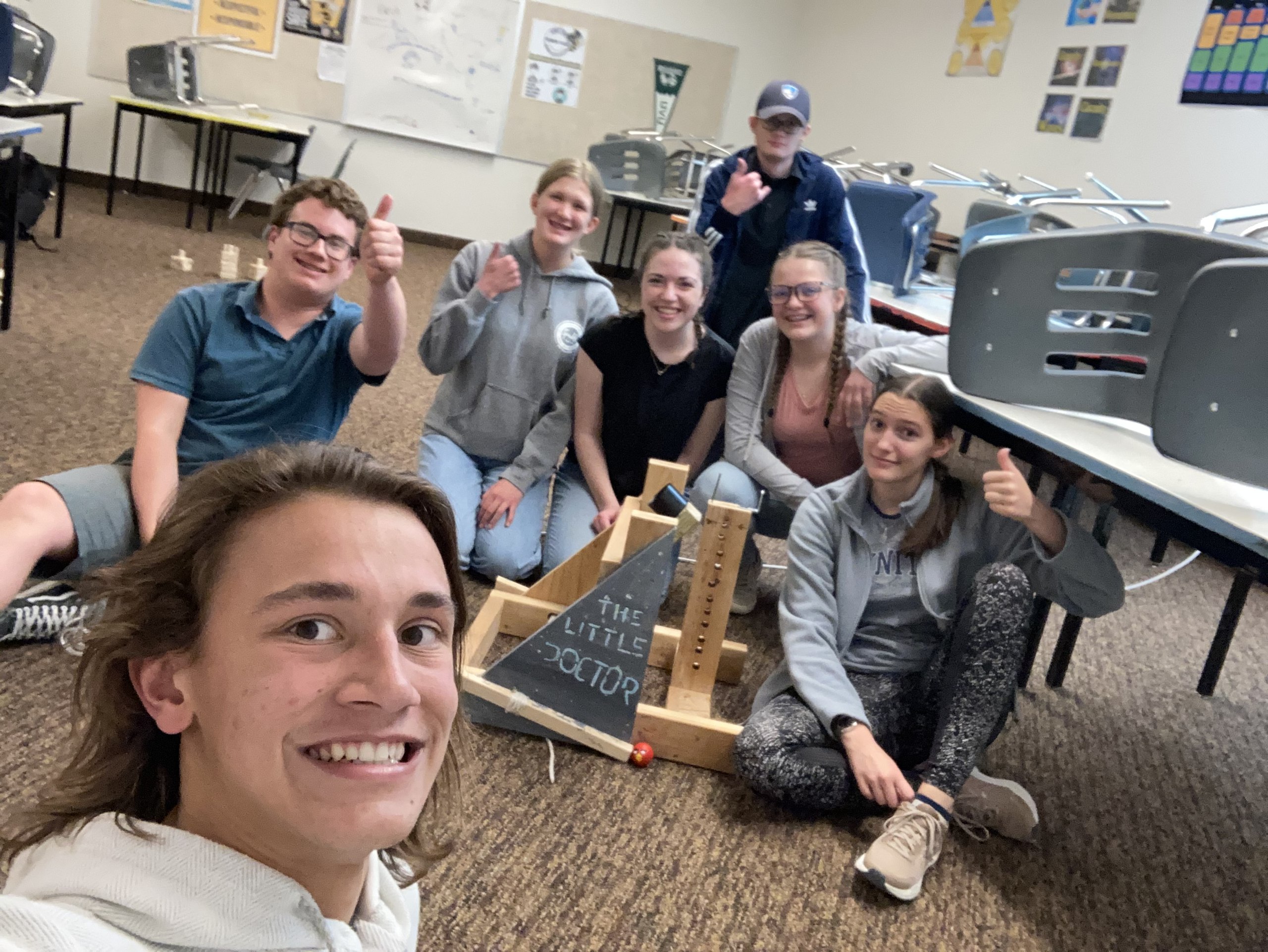 The Wasatch Science Olympiad team with The Little Doctor, our catapult