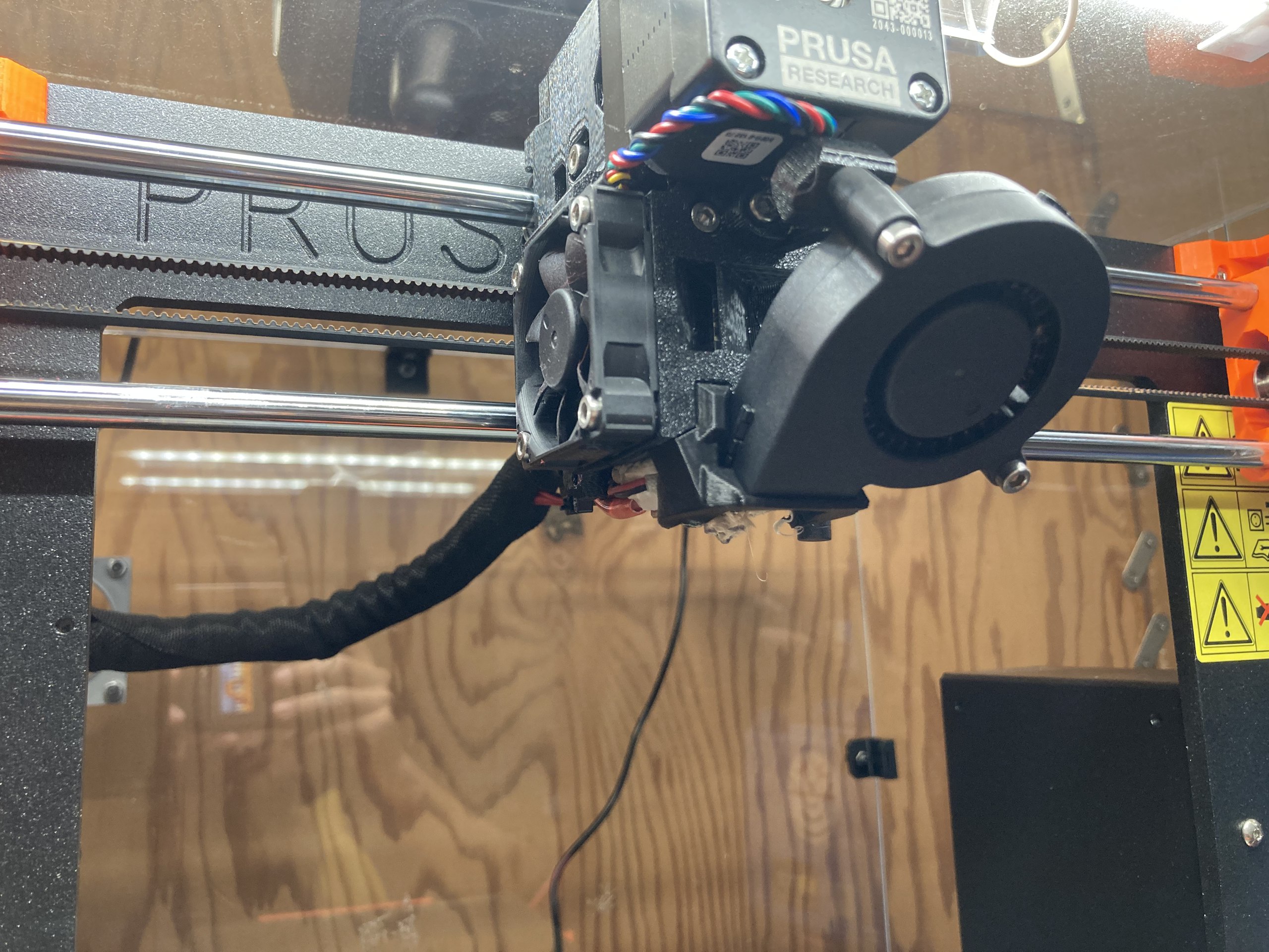 The print head of a Prusa 3D printer