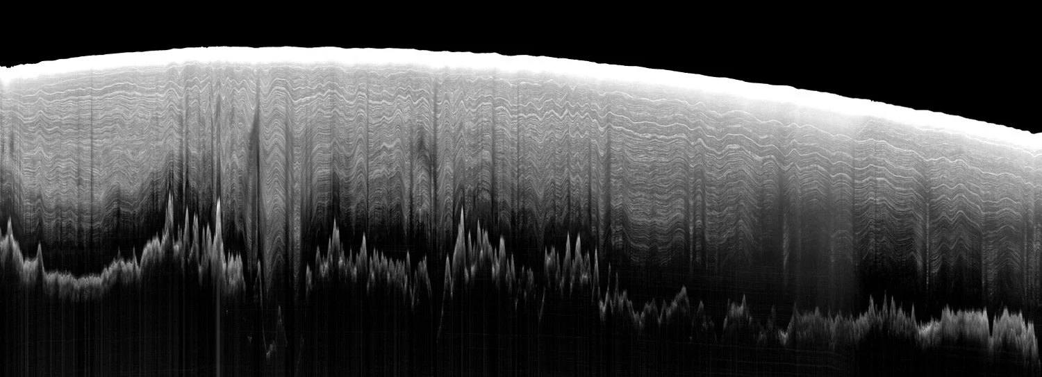 A radargram: radar echoes from the surface and the bed of an ice sheet, from the Radio Glaciology Lab